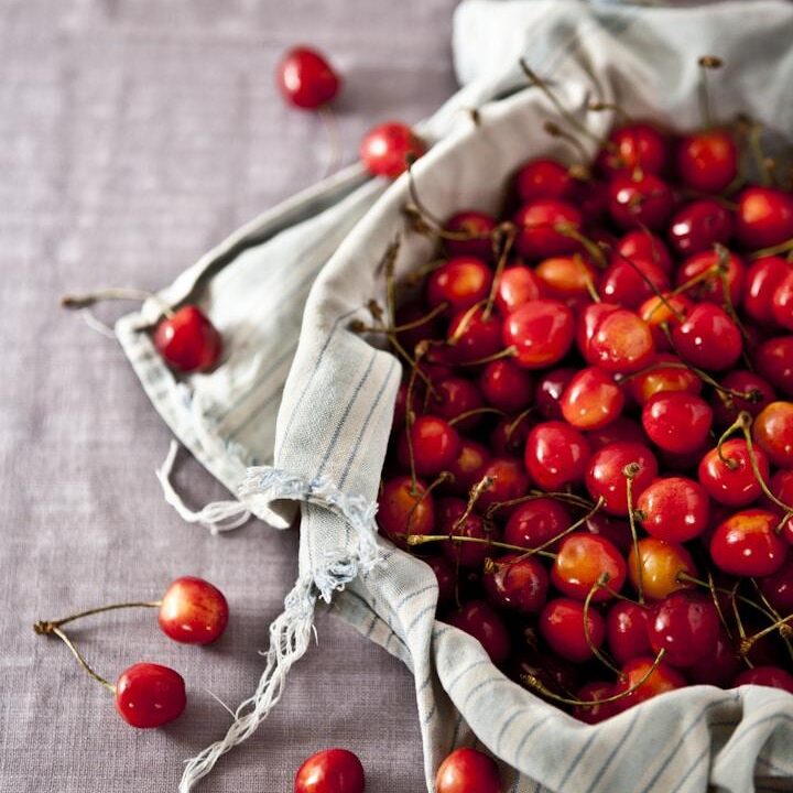 Photo by Neha Deshmukh shallow focus photography of cherry fruits